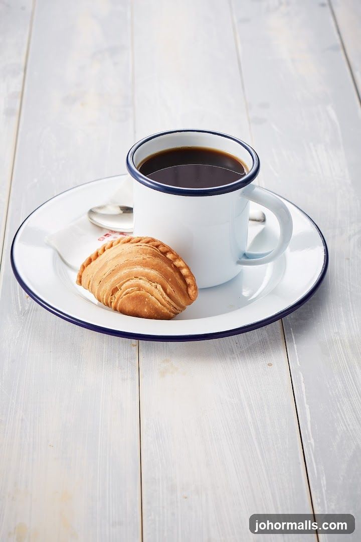 Coffee and pastry on plate