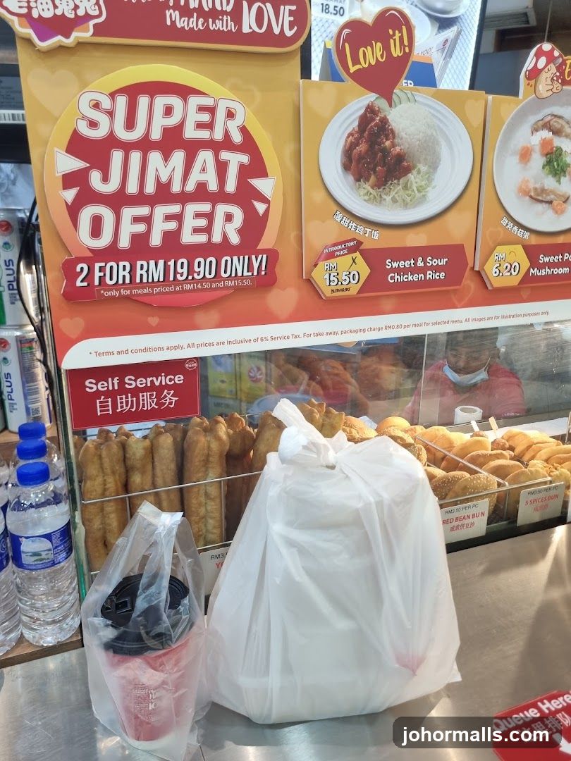 Food stall interior with promotional signage