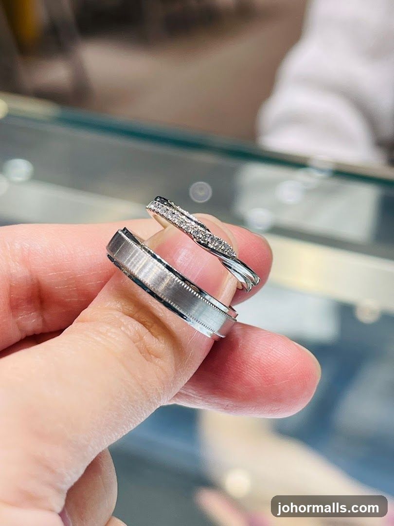 Hand Holding Rings