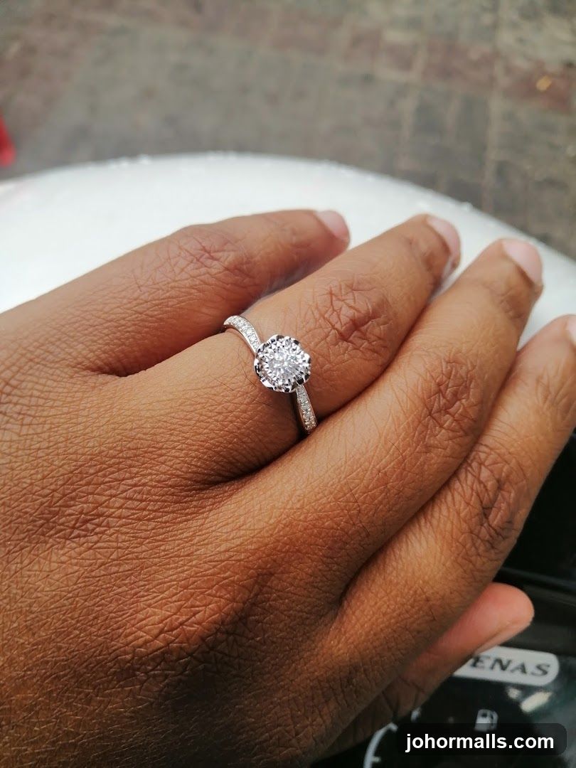 Hand with engagement ring