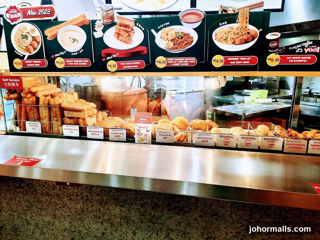 Food counter display with menu board above
