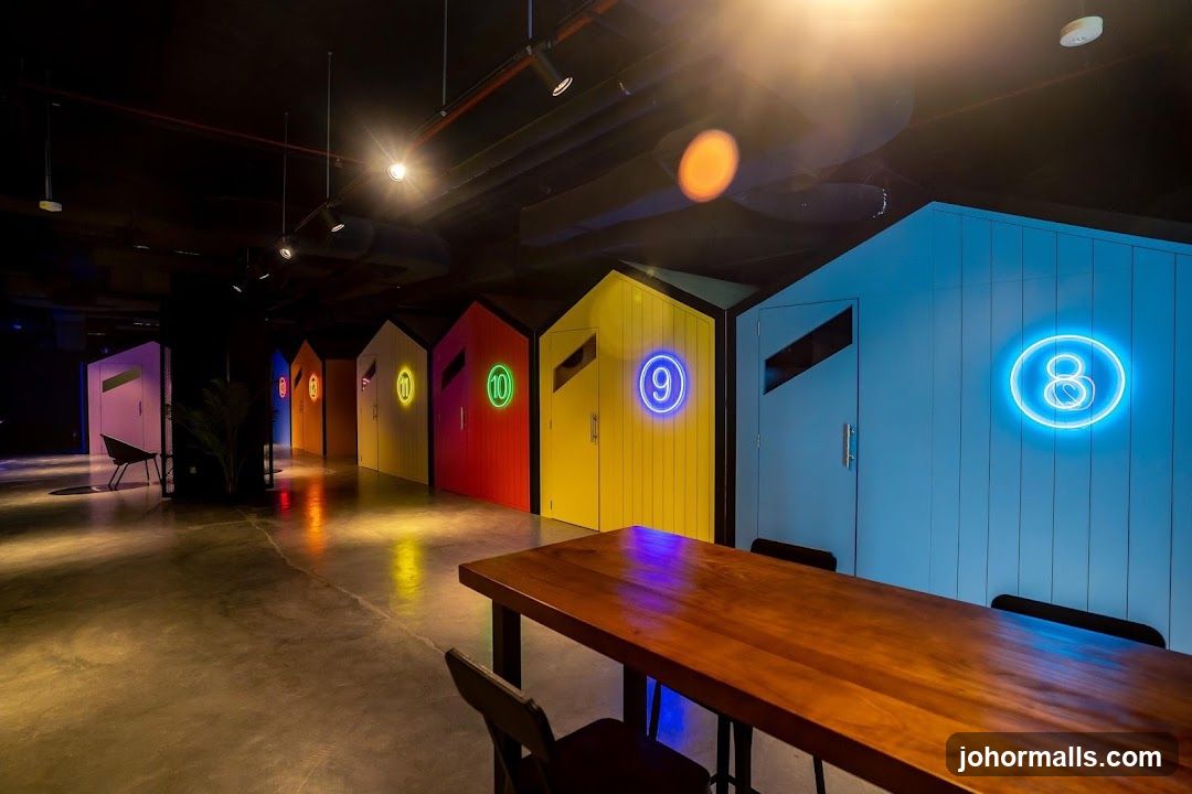 Interior of a colorful room with numbered cabins