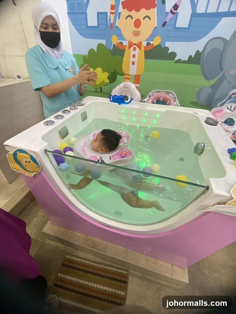 Baby in water therapy pool