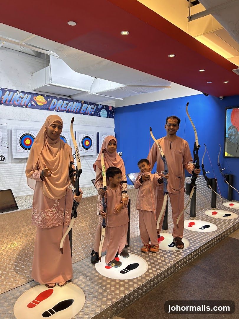 Family at indoor archery facility