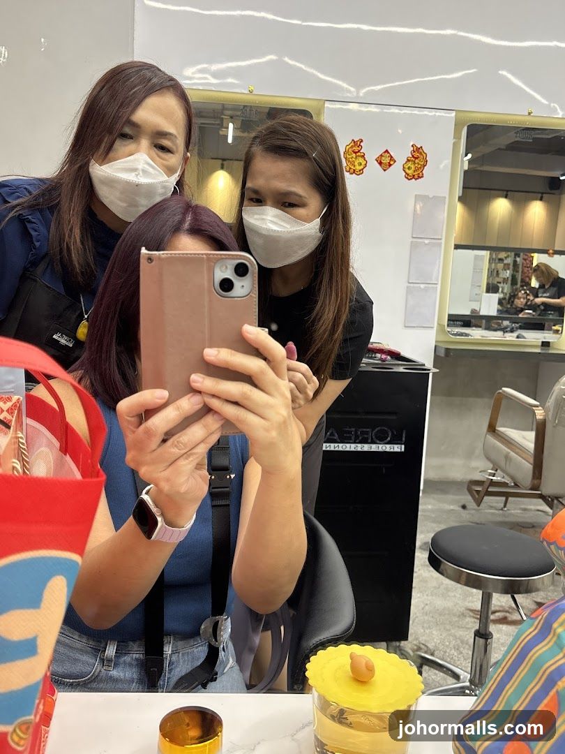 Group selfie in salon