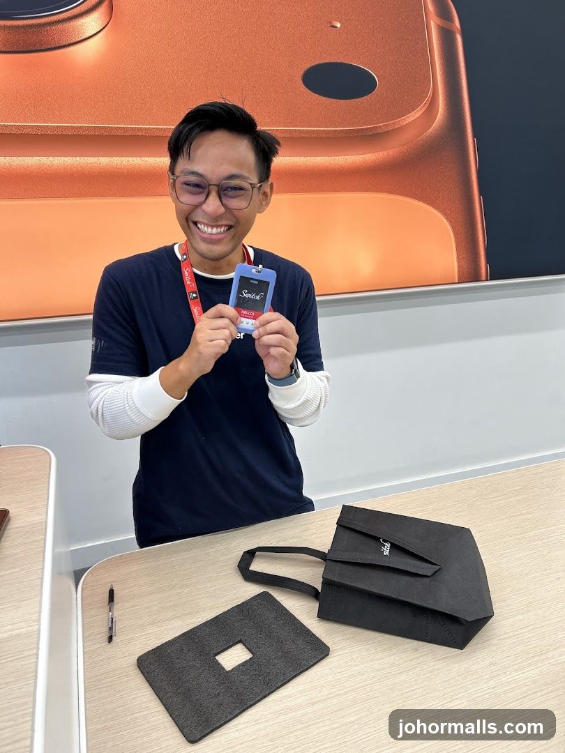 Staff Member Holding Product at Counter