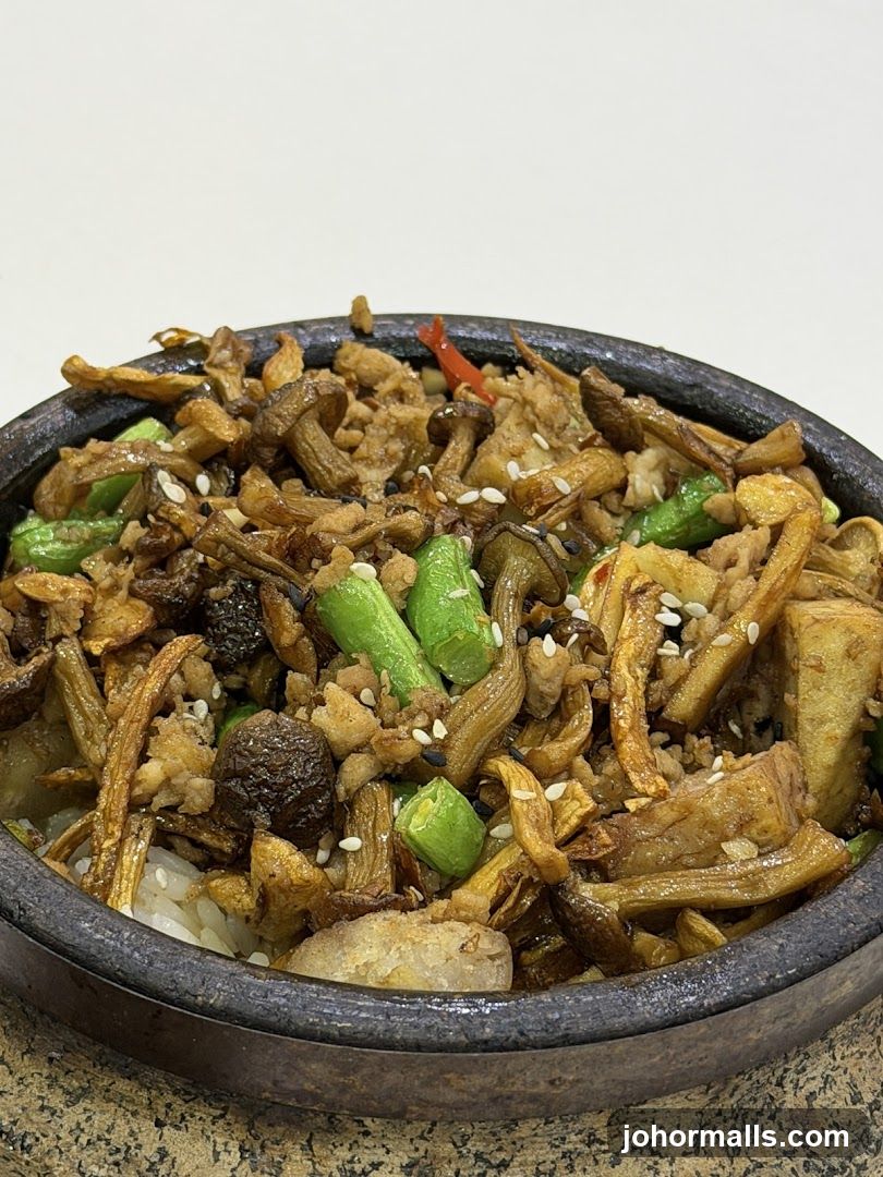 Stir-fried dish in stone bowl