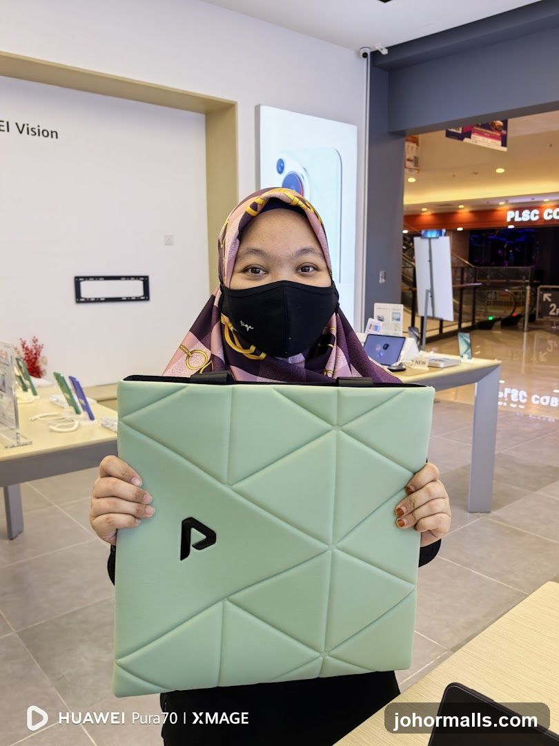 Customer in store holding product