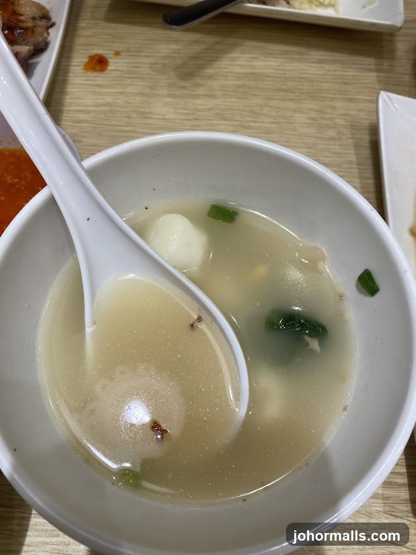 Bowl of soup with spoon