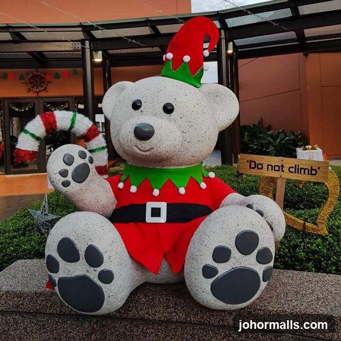 Christmas-themed bear statue