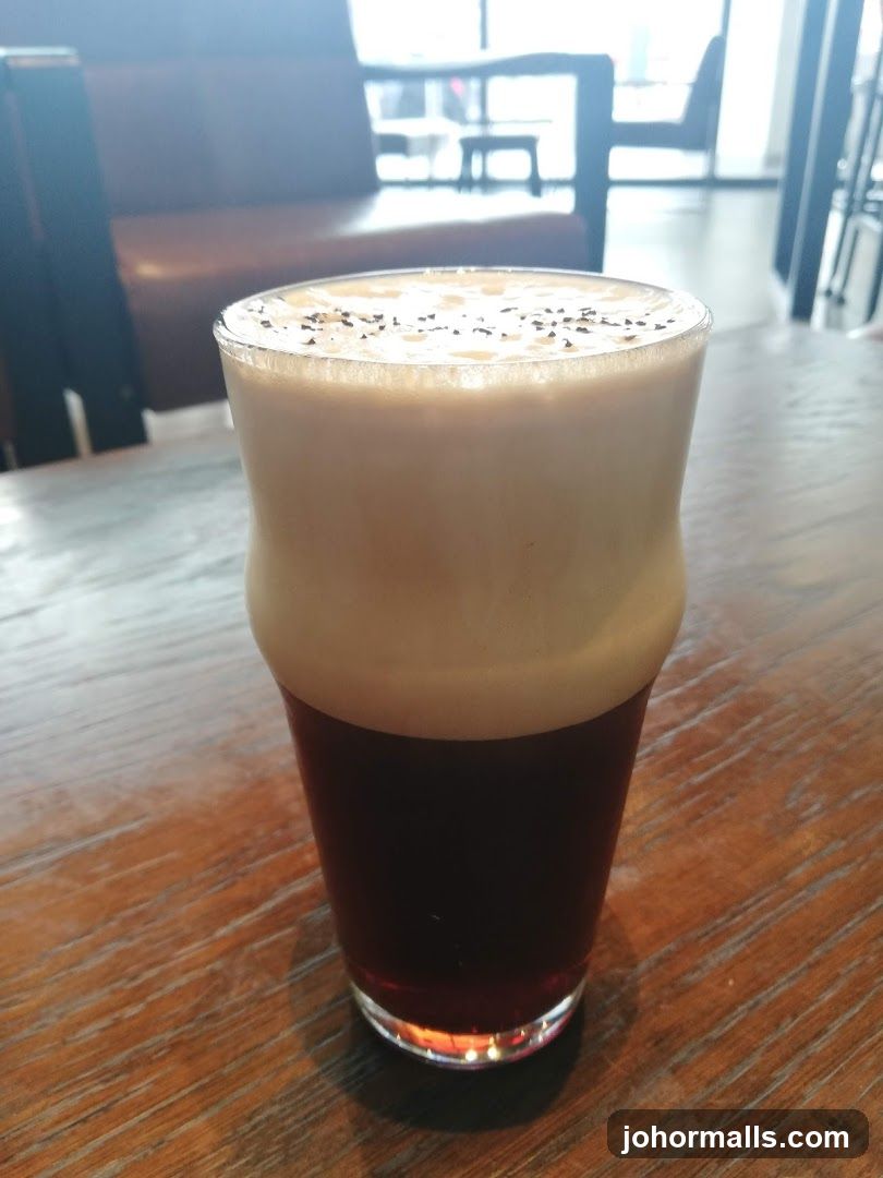 Coffee in Glass on Wooden Table