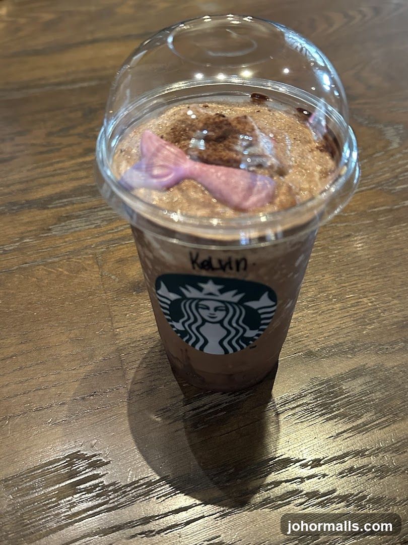 Starbucks Cup on Wooden Surface