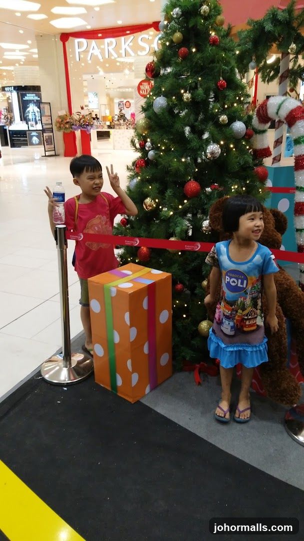 Children at Christmas display in shopping mall