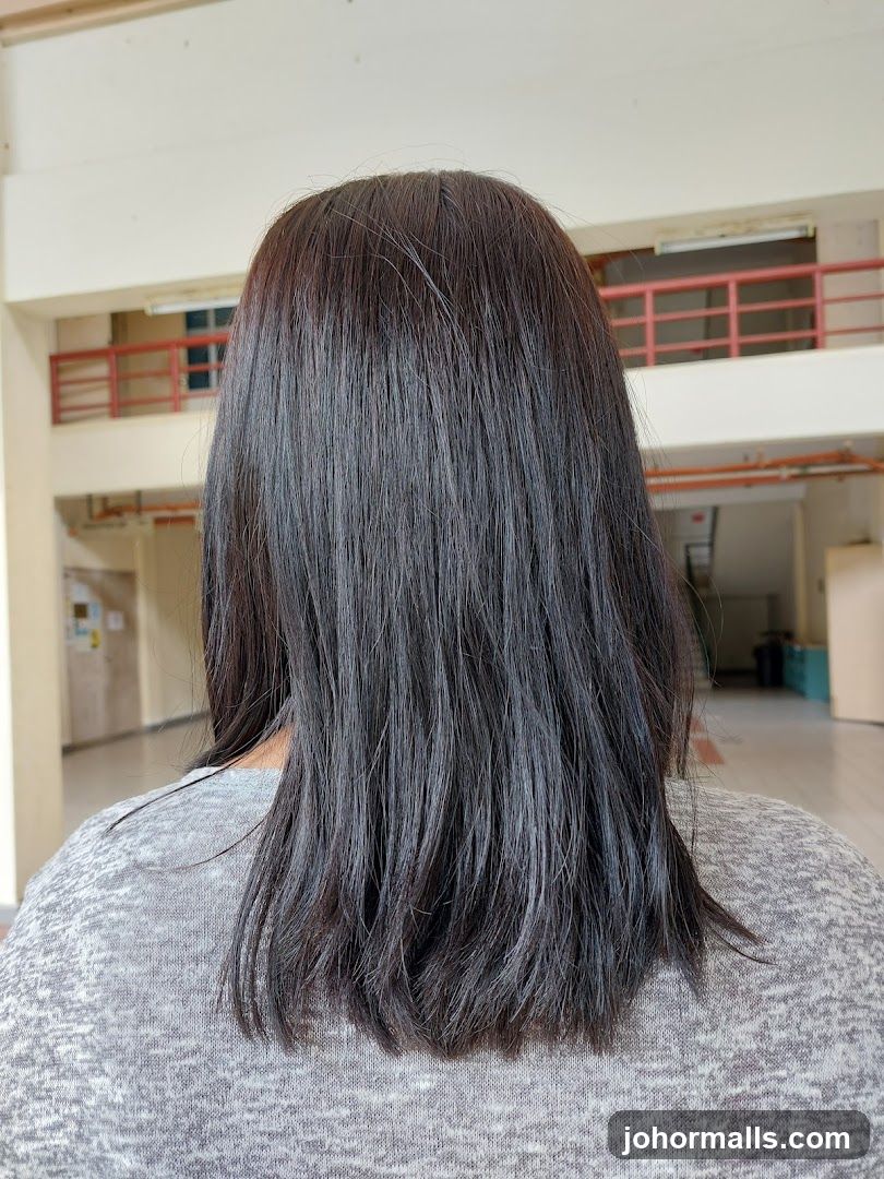 Back view of person with long hair