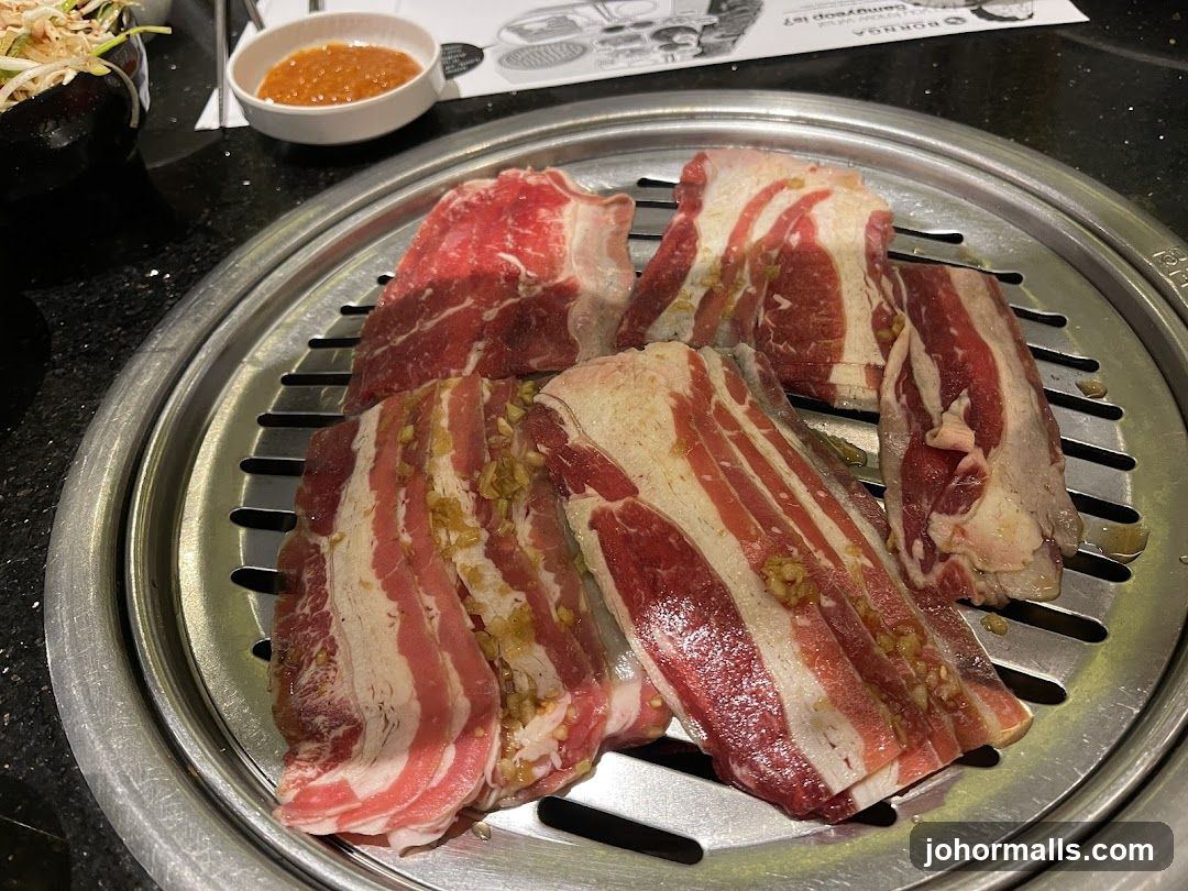 Grilled meat on barbecue grill