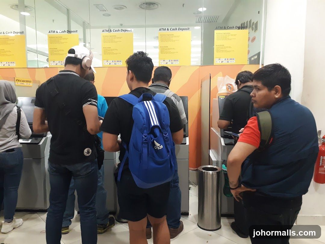 People at ATMs