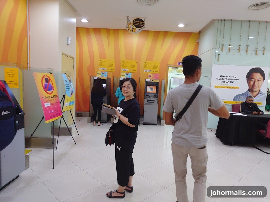 Bank Interior with ATMs and Promotional Materials