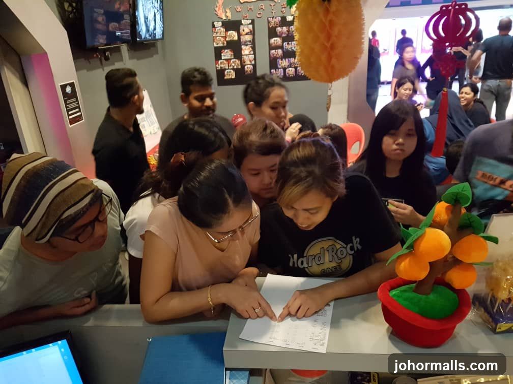 People looking at a menu