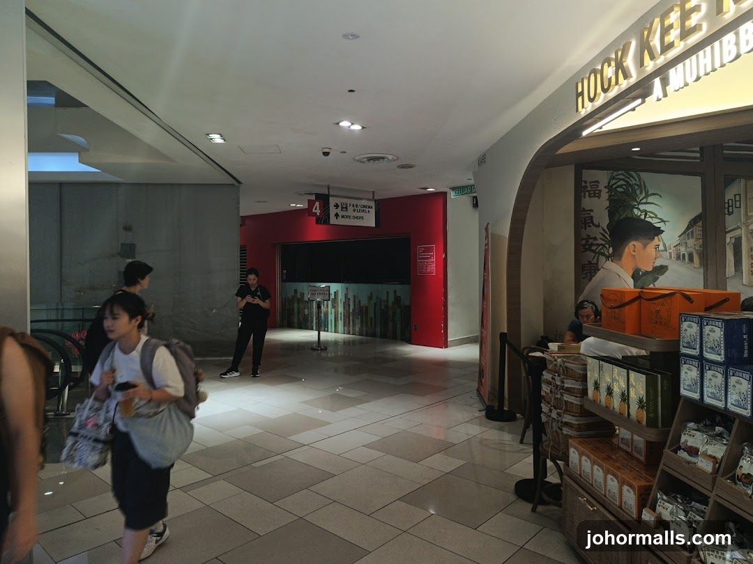 Indoor shopping mall corridor with shops