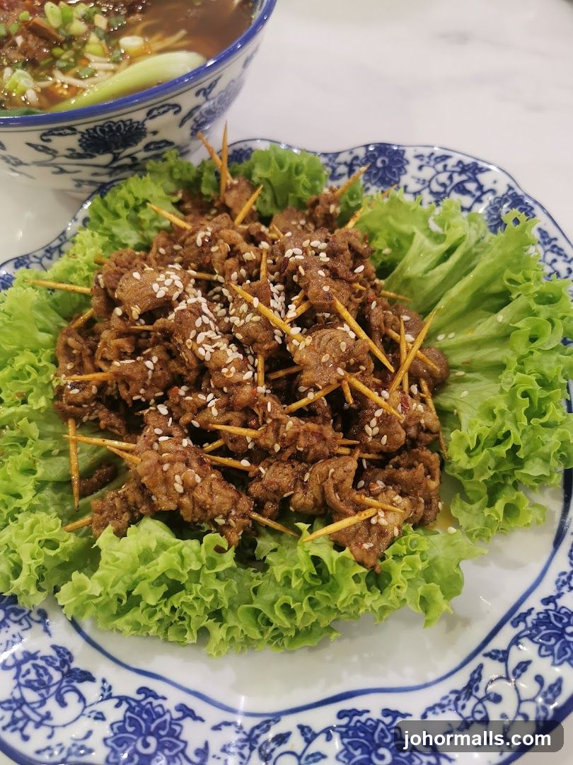 Spicy Beef Skewers with Lettuce and Noodles