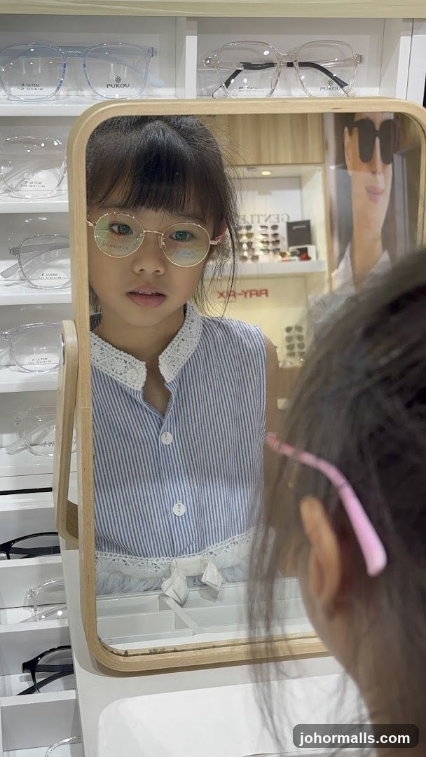 Girl Trying on Glasses