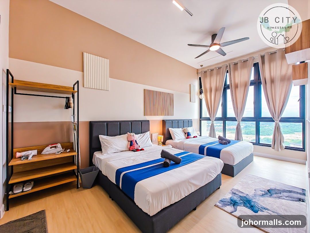 Bedroom with two beds and city view