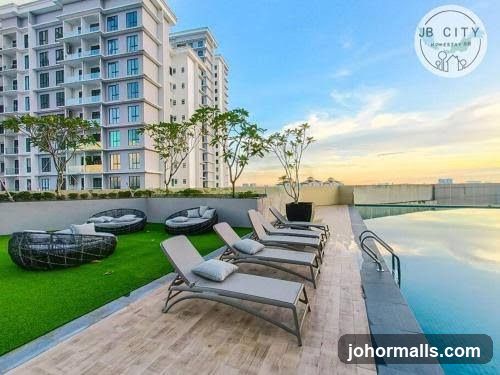 Rooftop Pool Area with Lounge Chairs and Seating