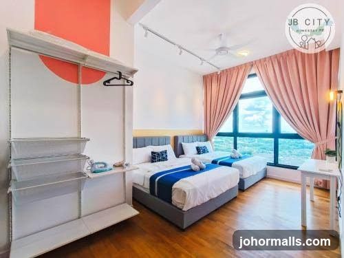 Bedroom with two beds and a large window