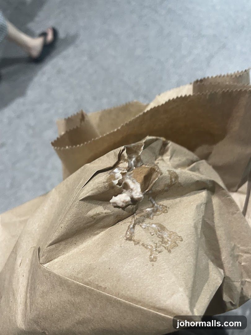 Brown paper bag with white residue
