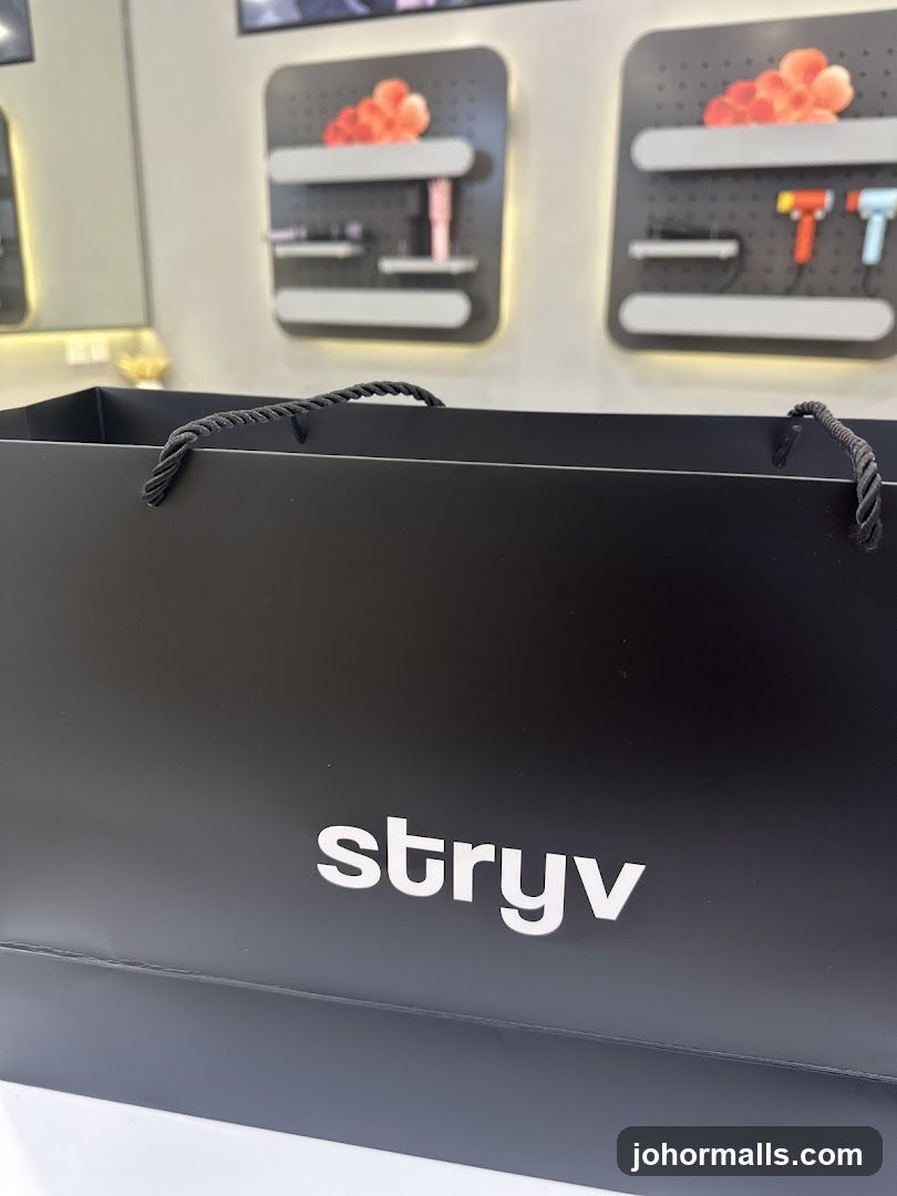 Black shopping bag with logo
