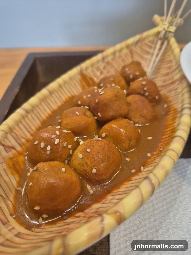 Curried Meatballs with Sesame Seeds