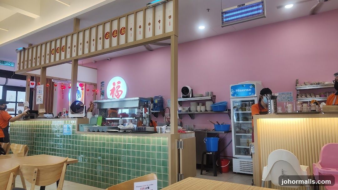 Restaurant Interior with Pink Walls and Green Tiles