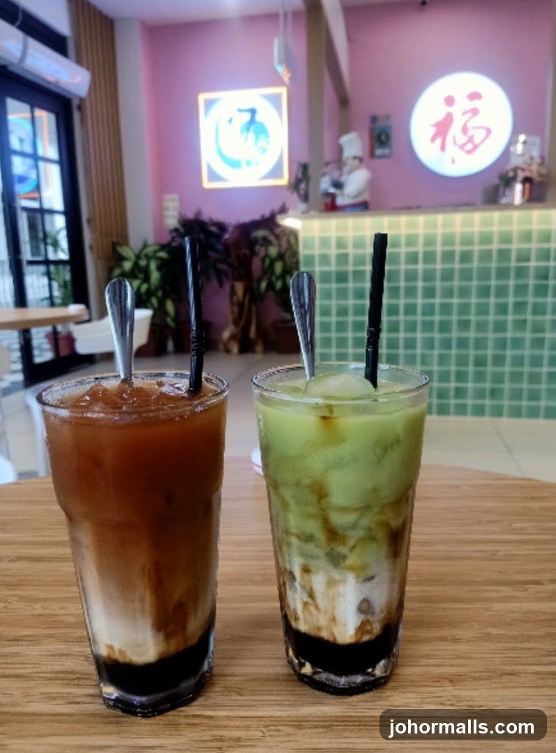 Two Iced Drinks on a Wooden Table