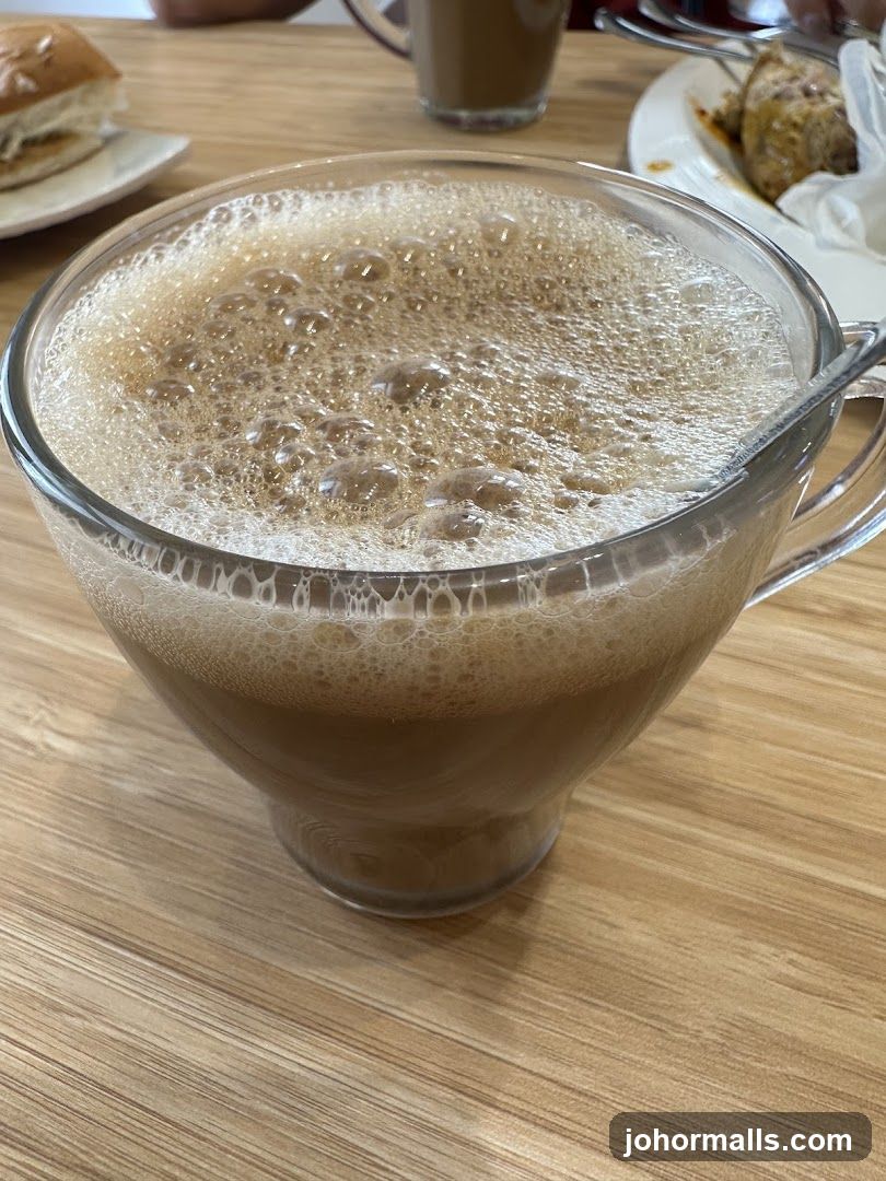 Frothy Drink in a Glass Cup
