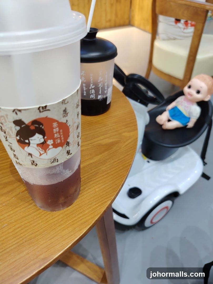 Beverage and Toy on Table