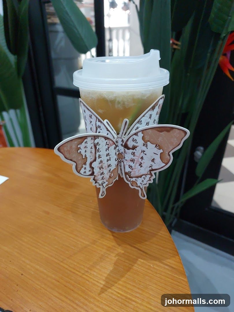 Butterfly-themed Drink Sleeve