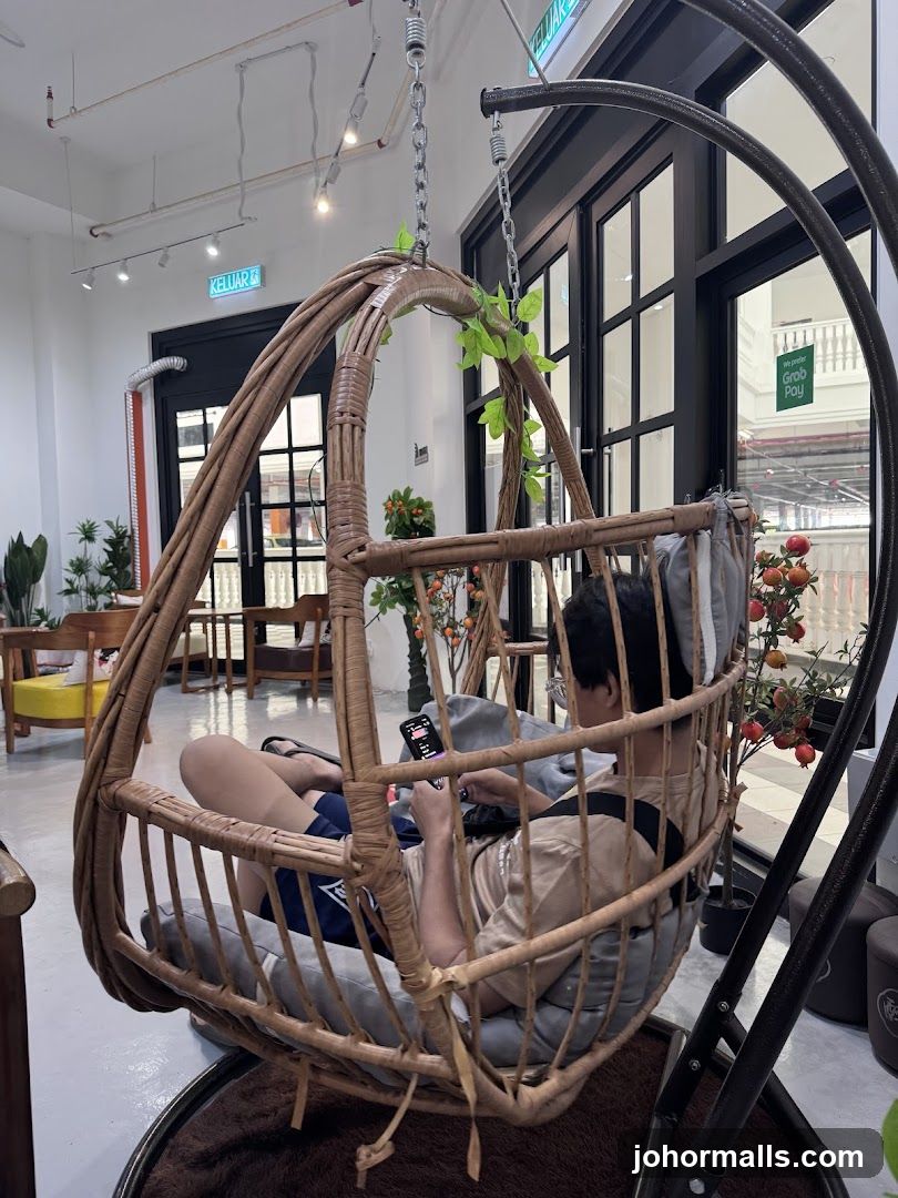 Person relaxing in a hanging chair
