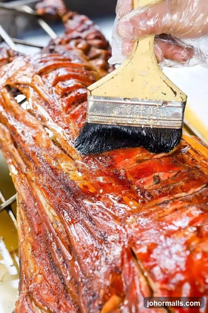 Roast Pig Being Brushed