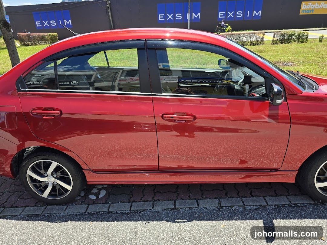 Red Car Parked Outside Building