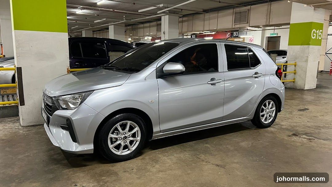 Silver Car in Parking Garage