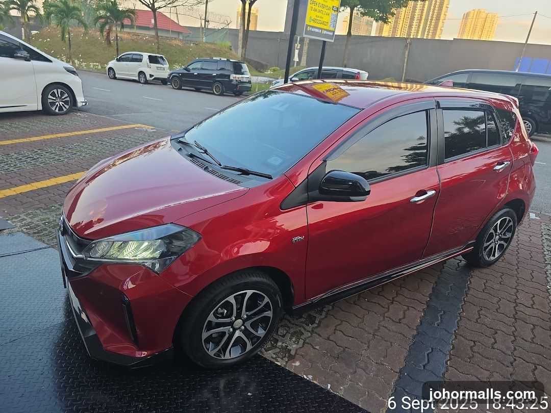 Red Hatchback Car
