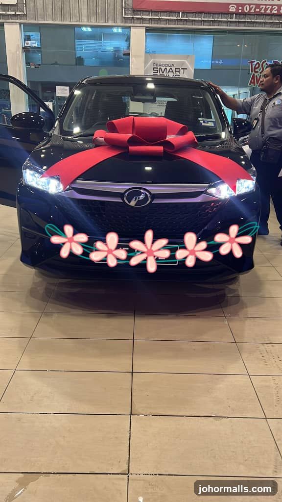 Car with a Large Red Bow