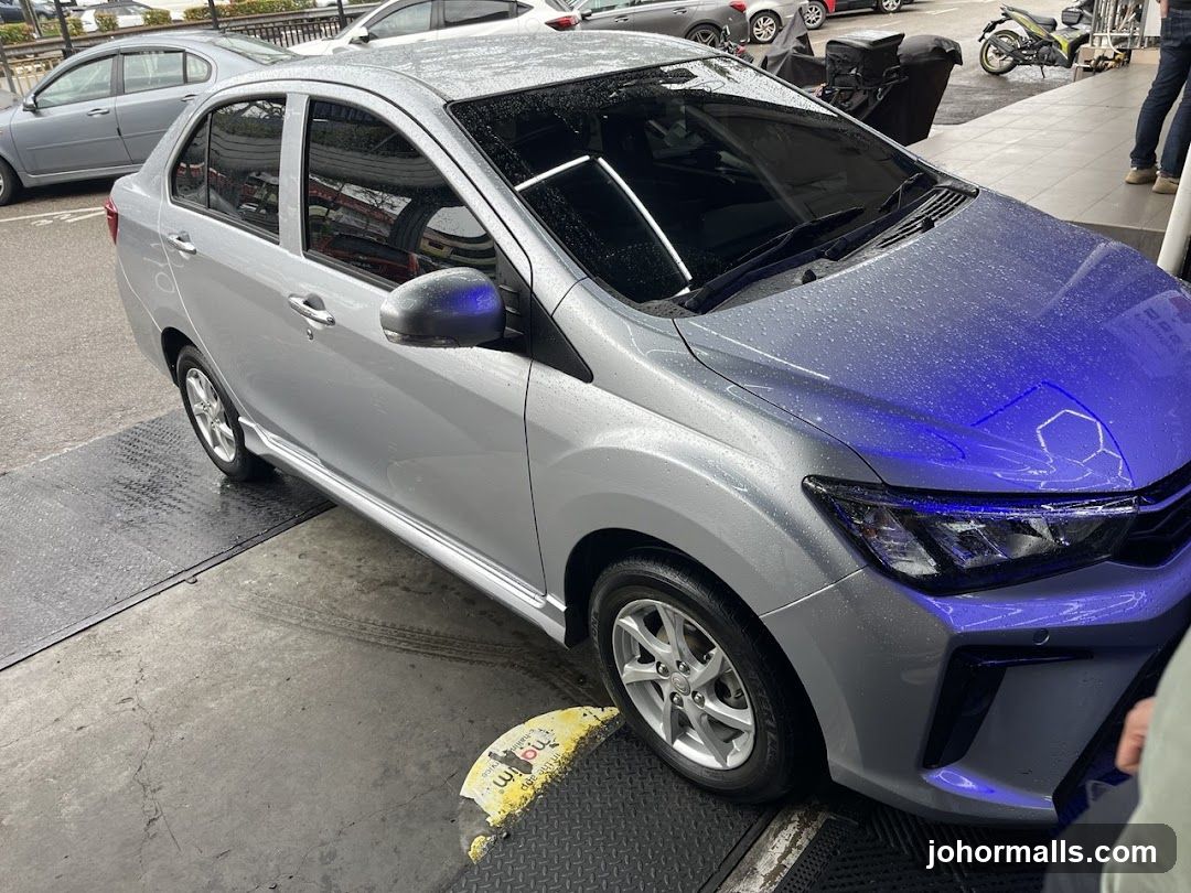 Silver Car with Water Droplets