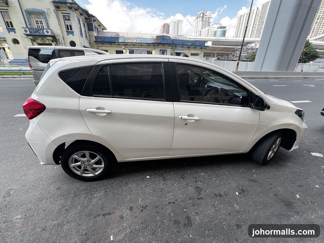 White hatchback car on a street