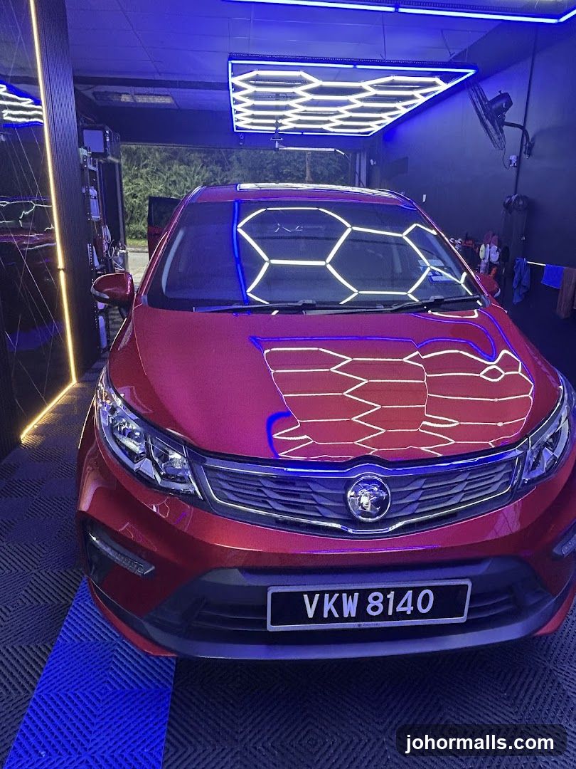 Red Car in a Well-Lit Garage