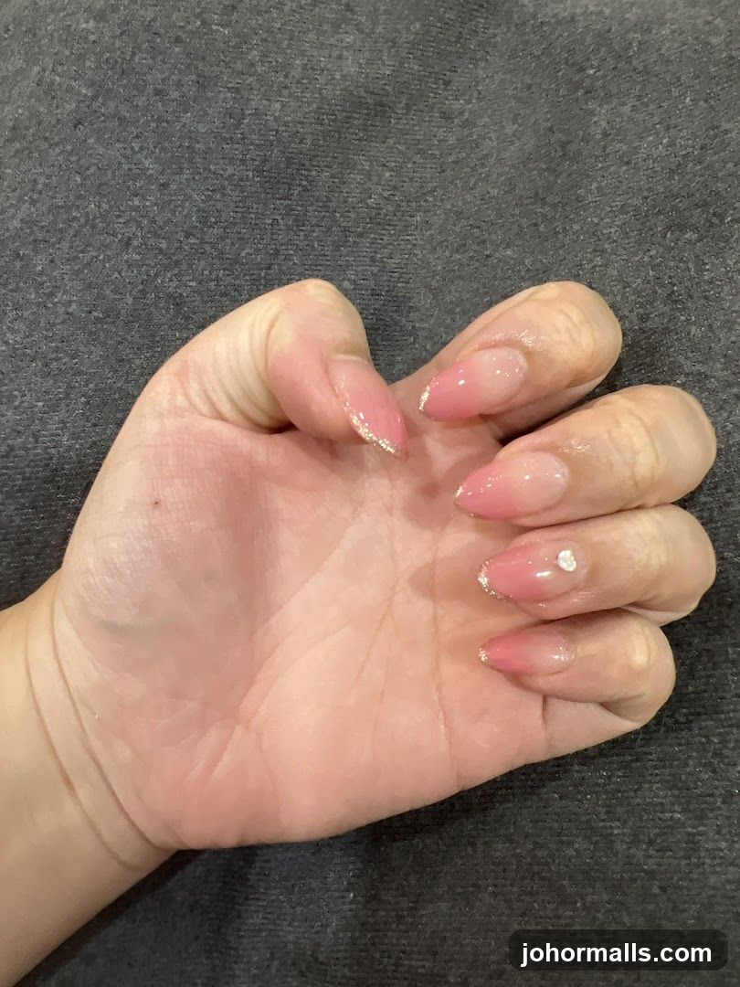 Pink Ombre Nails with Glitter Accents