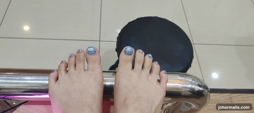 Pedicure with Blue and Silver Design