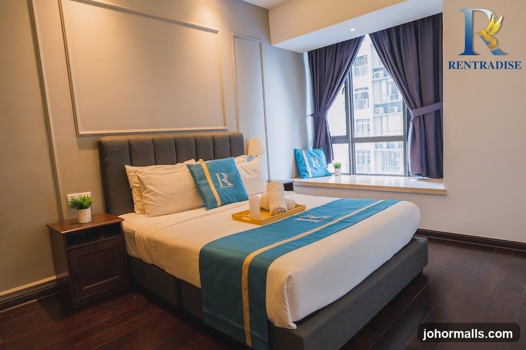Bedroom with a large bed and window