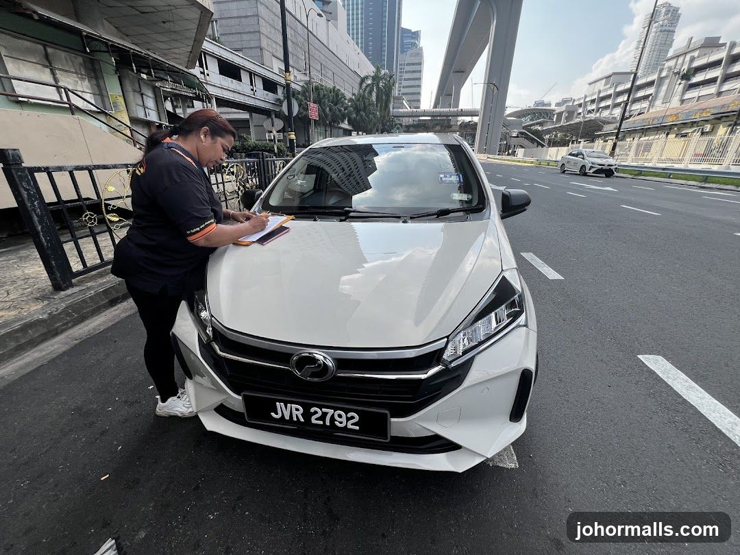 Woman writing on clipboard next to car