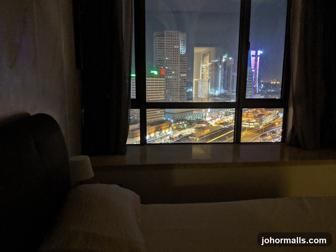 Cityscape at Night from a Window